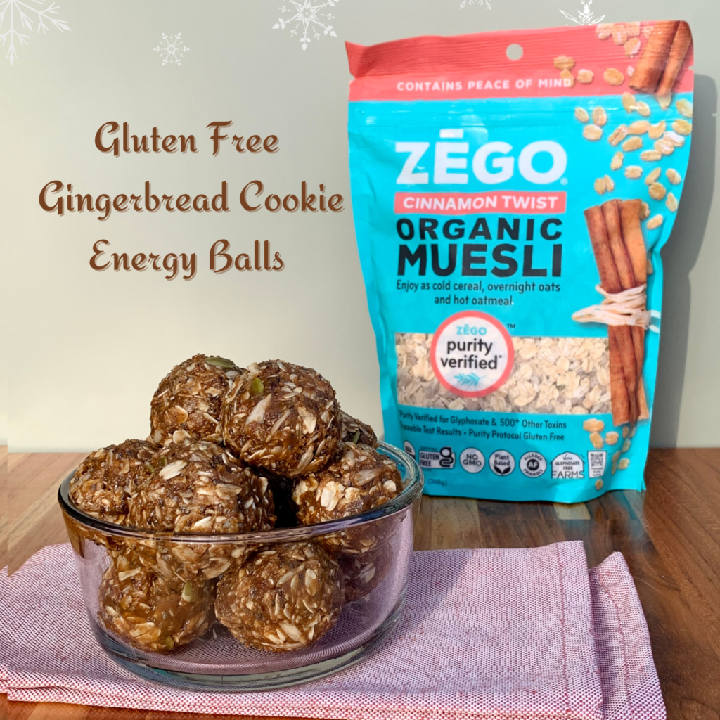 A bowl of homemade gluten free gingerbread cookie energy balls next to a bag of ZEGO Cinnamon Twist Organic Muesli