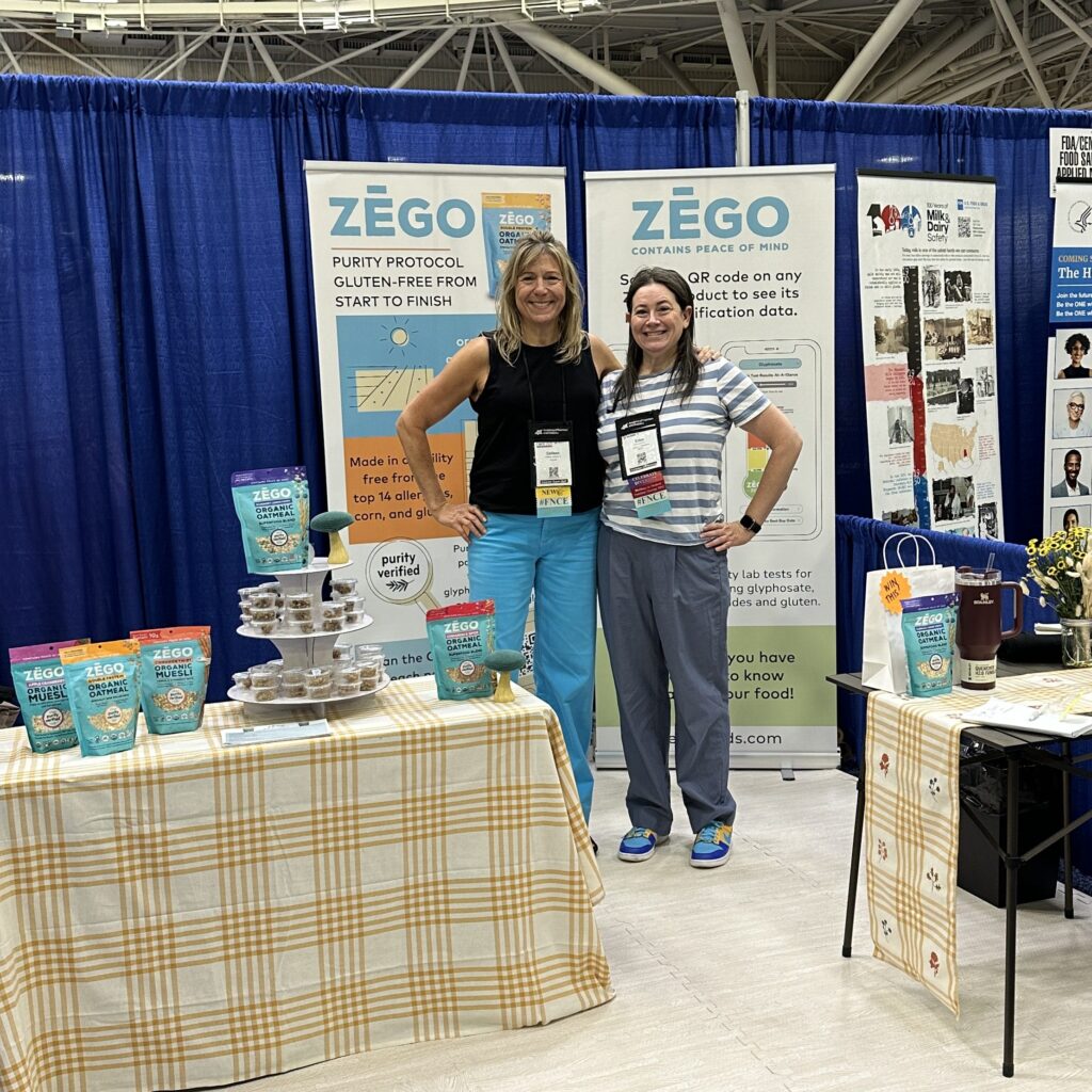 ZEGO Founder Colleen Kavanagh and ZEGO Marketing Director Erica Dermer pose in ZEGO's Expo booth.