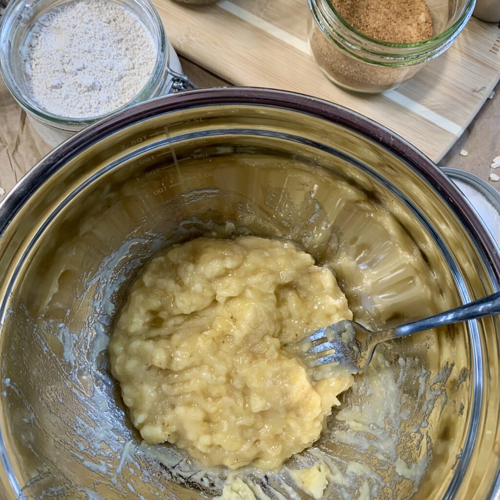 Mixing bowl with mashed banana